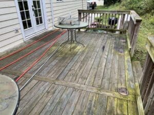 Complete Power Wash cleaning of a dirty deck before Halloween